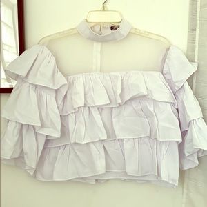Long sleeved white ruffle boutique blouse